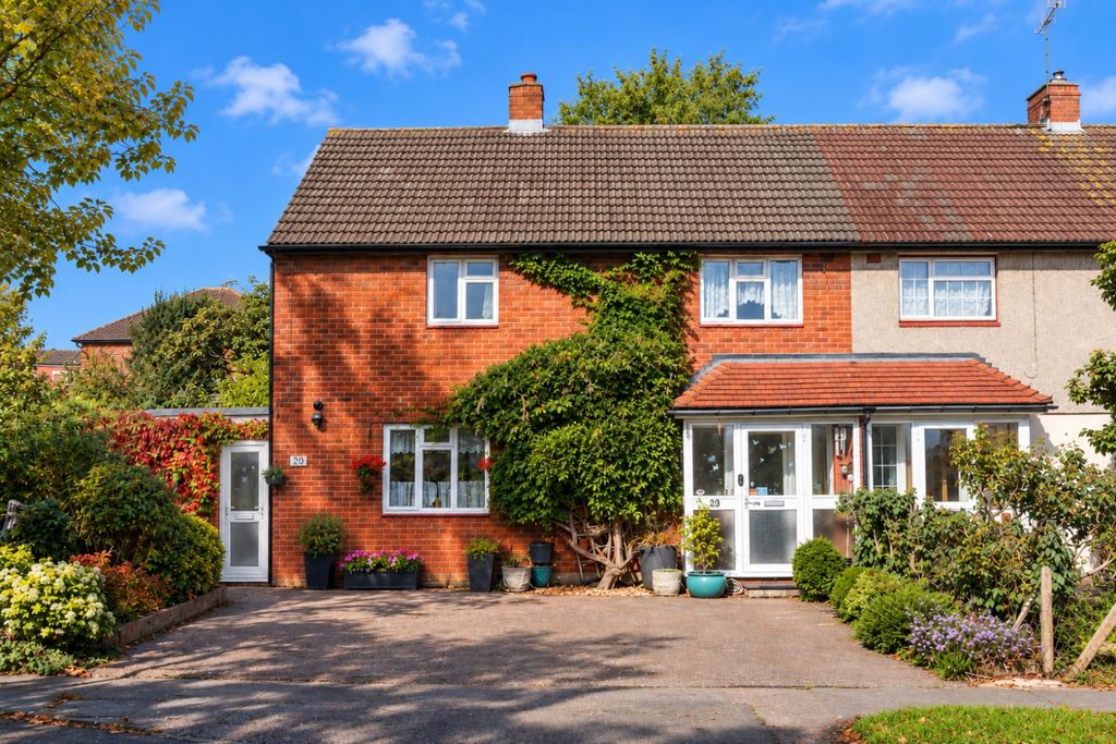 Property photo 1 of 16 Suburban Home With Lush Garden And Side Door