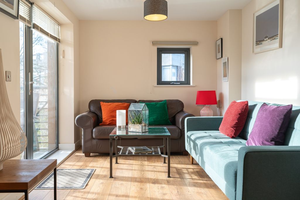 Property photo 1 of 12 Living Area