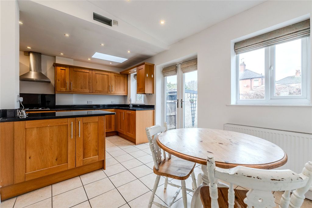 Property photo 2 of 17 Dining Kitchen