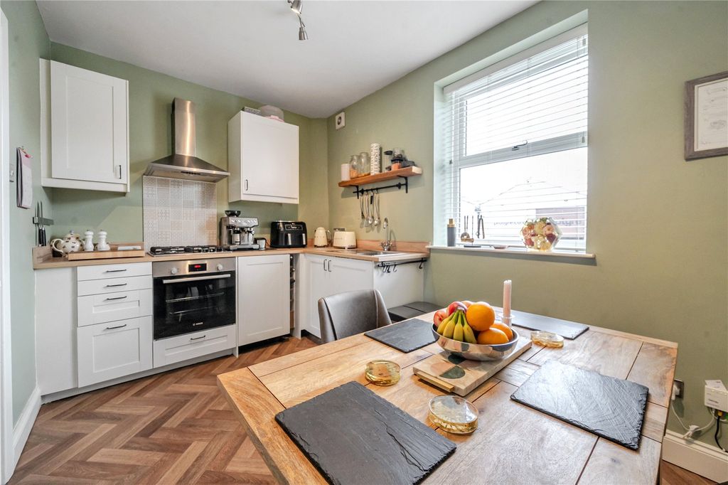 Property photo 2 of 13 Dining Kitchen