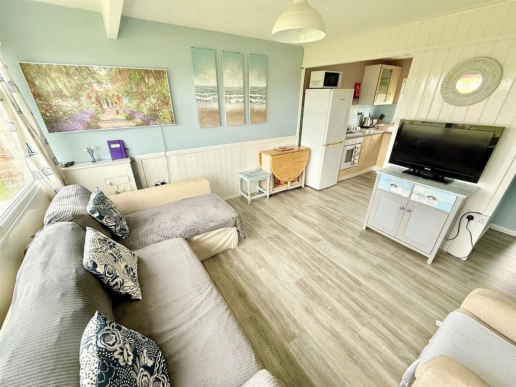 Property photo 2 of 10 Living Area