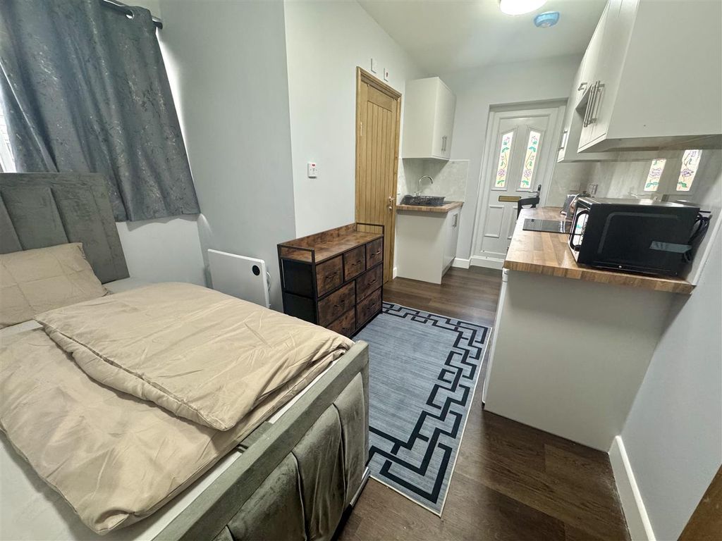 Property photo 3 of 6 Tempimagetd34CL.Jpg