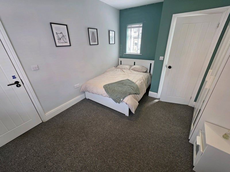 Property photo 3 of 9 A Neat And Cozy Double Bedroom Featuring A Comfort...