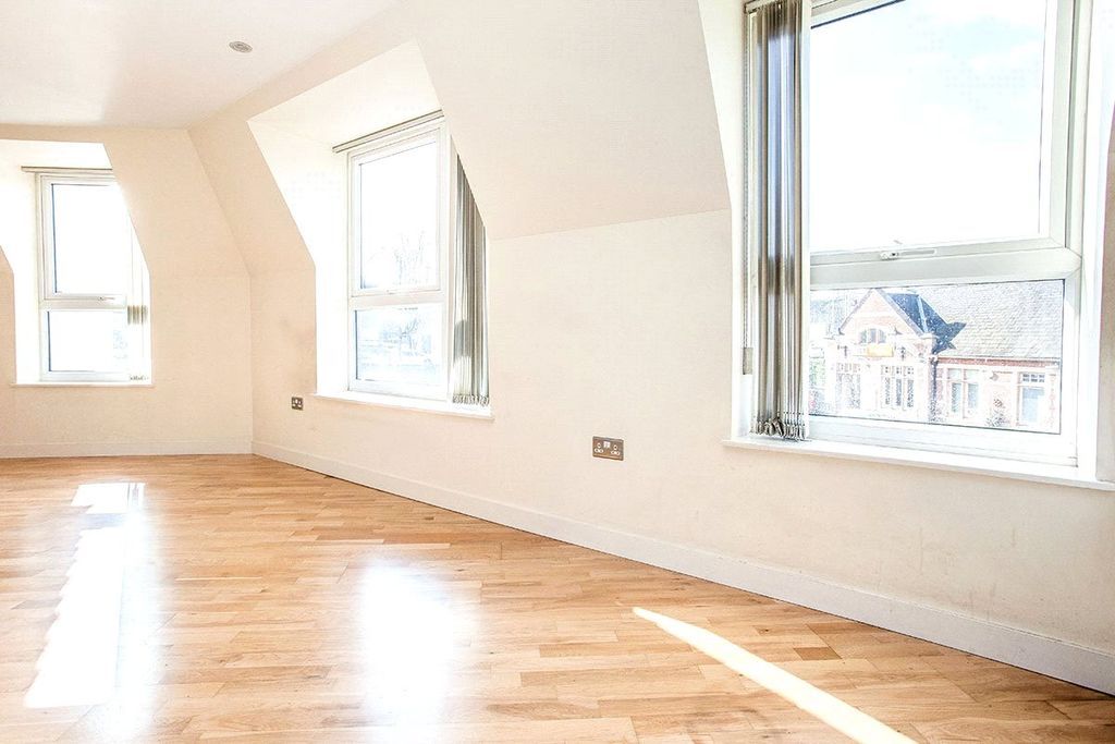 Property photo 2 of 12 Living Room