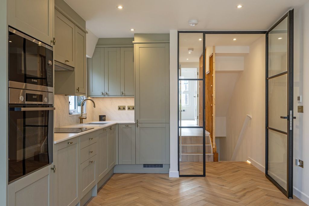 Property photo 2 of 12 Kitchen
