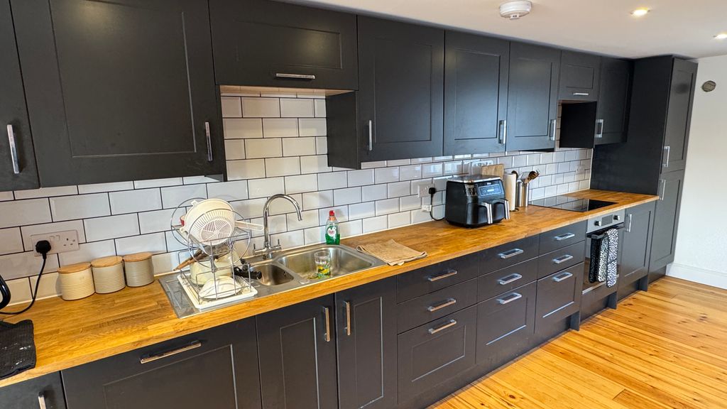 Property photo 3 of 13 Kitchen