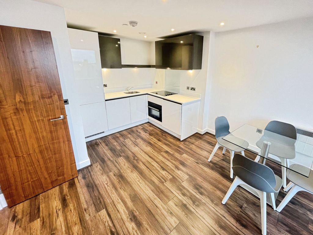Property photo 3 of 8 Kitchen Area