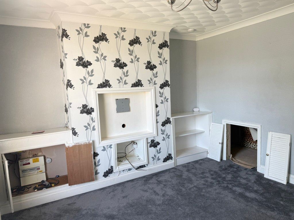 Property photo 2 of 11 Living Room In House In Need Of Refurbishment