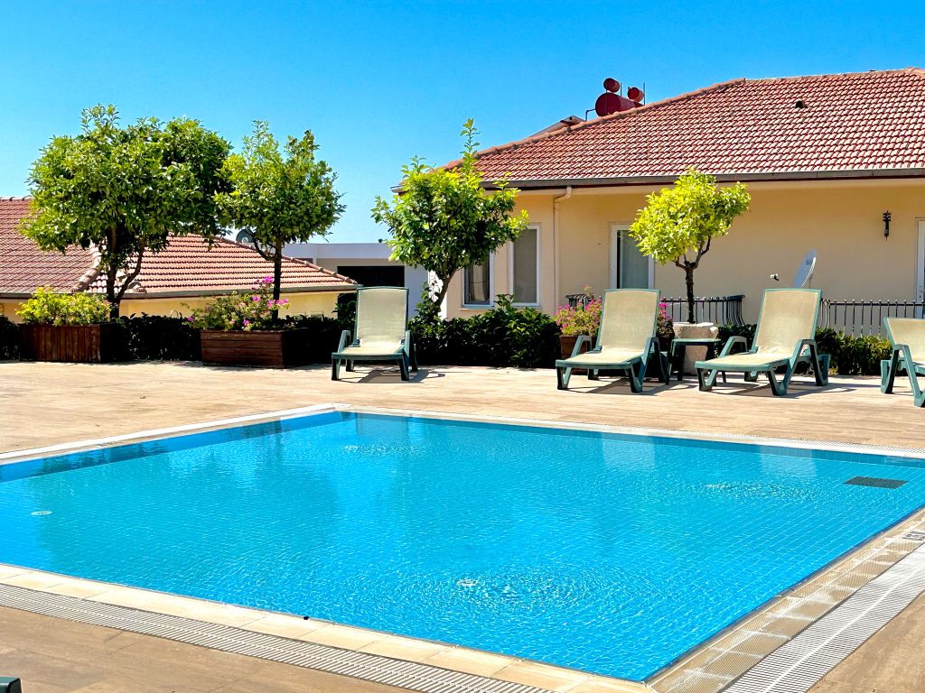 Property photo 2 of 22 Sea View Three-Bedroom Villa For Sale In Kargicak, Alanya - Communal Swimming Pool