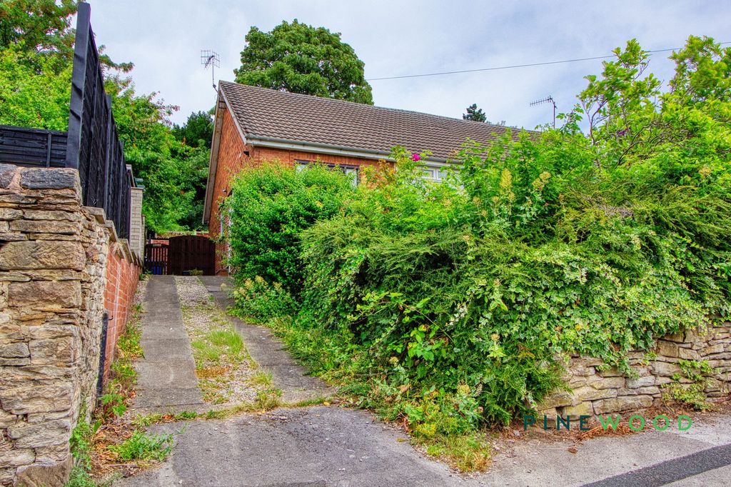 Property photo 2 of 14 Driveway
