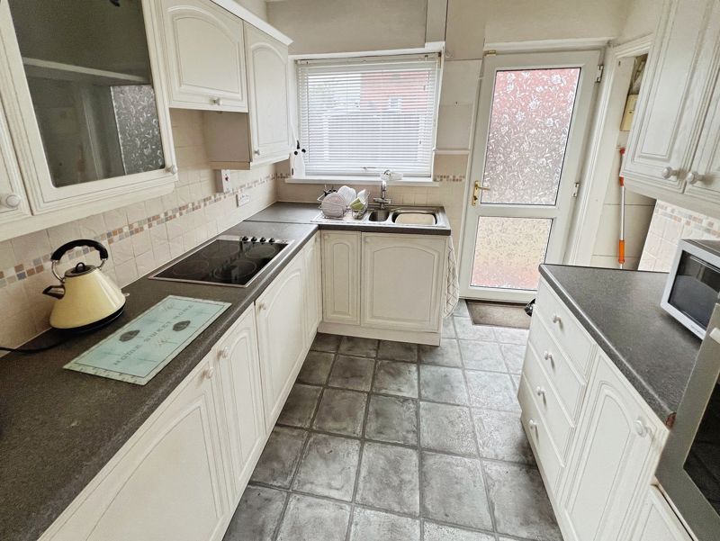 Property photo 3 of 12 Kitchen