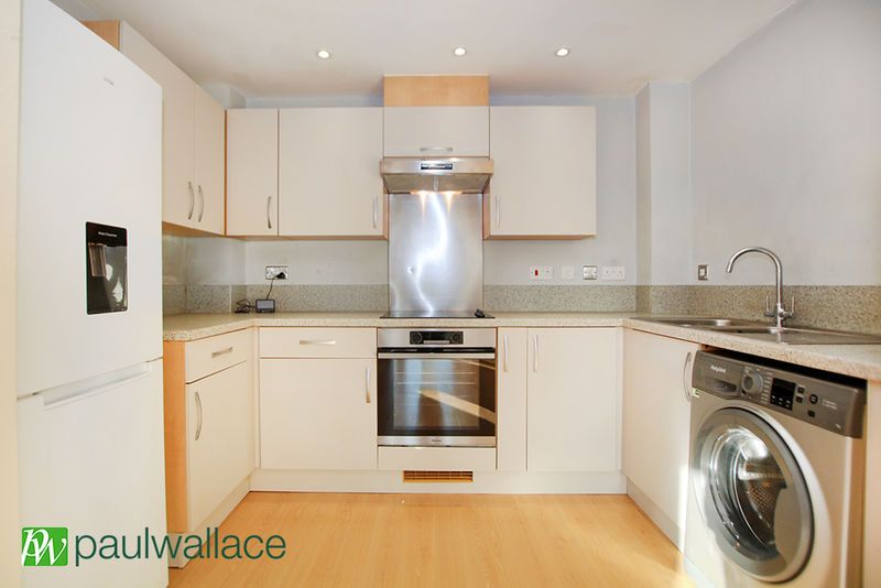 Property photo 3 of 12 Kitchen