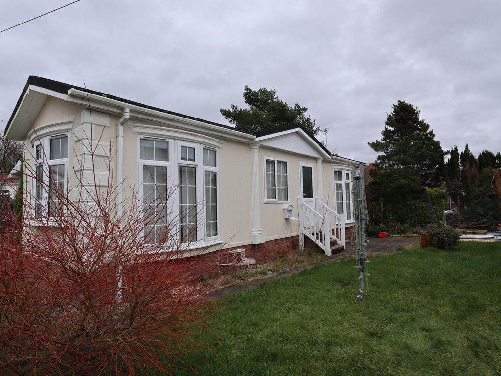 Property photo 1 of 12 Front (Exterior)