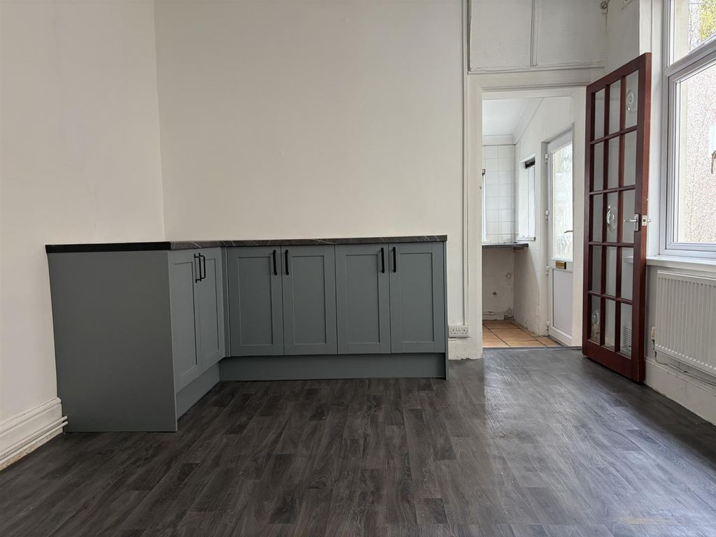 Property photo 3 of 13 Kitchen And Dining Area.Jpg