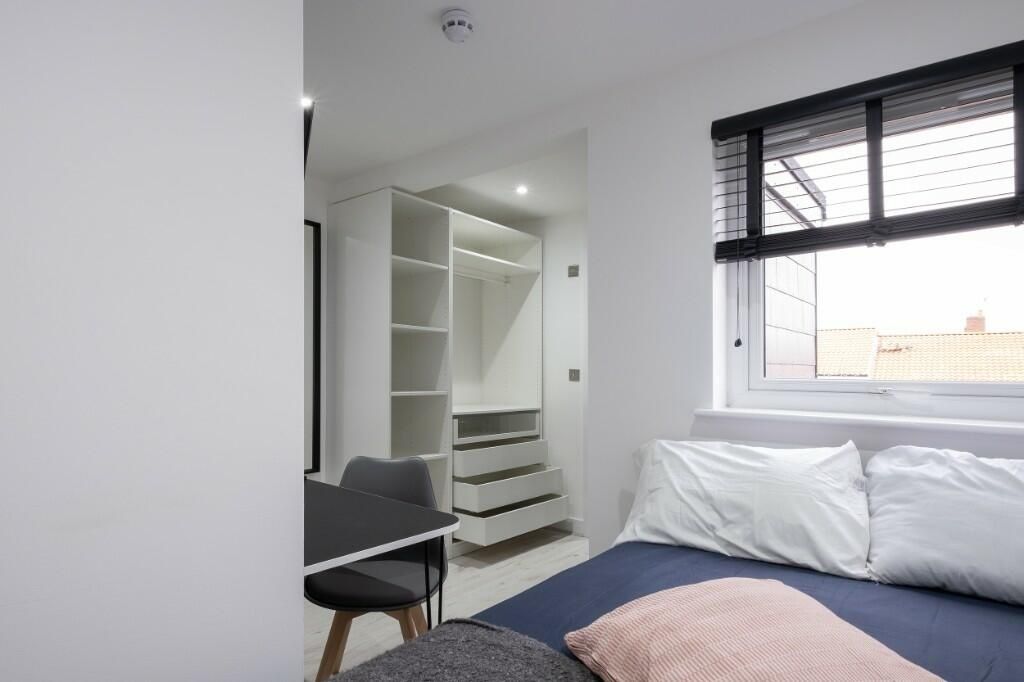 Property photo 1 of 11 A Bright And Tidy Bedroom Featuring A Comfortable ...