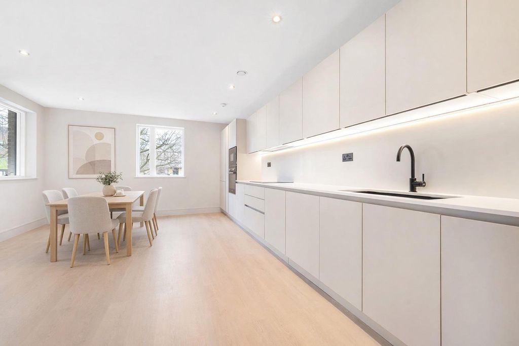Property photo 3 of 13 Kitchen And Dining Area.Jpg