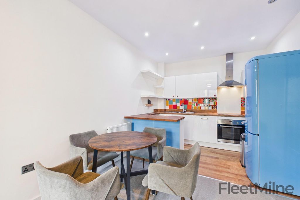 Property photo 3 of 10 Living/Dining Area