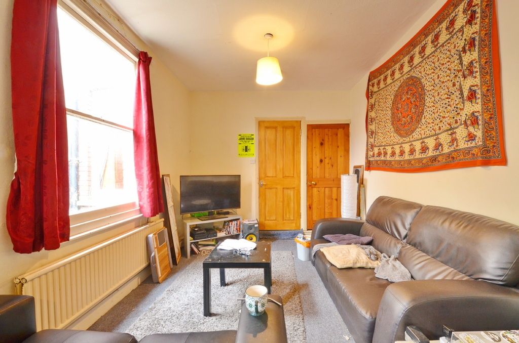 Property photo 3 of 10 Bright And Comfortable Living Room With Large Wind...