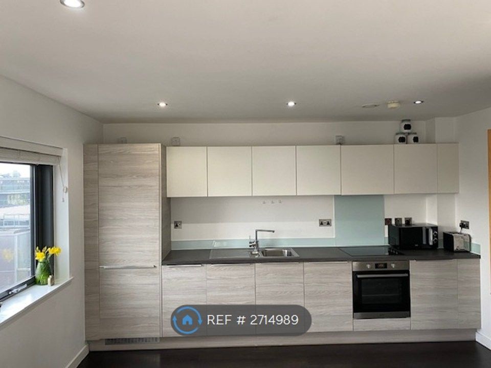 Property photo 3 of 8 Open Bright Kitchen