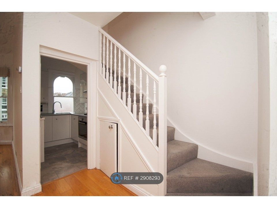 Property photo 3 of 12 Hallway View To Kitchen And Stairs