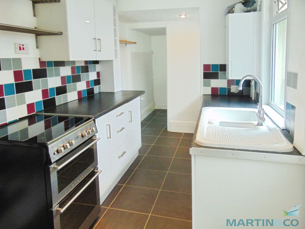 Property photo 2 of 8 F0B63121-Kitchen