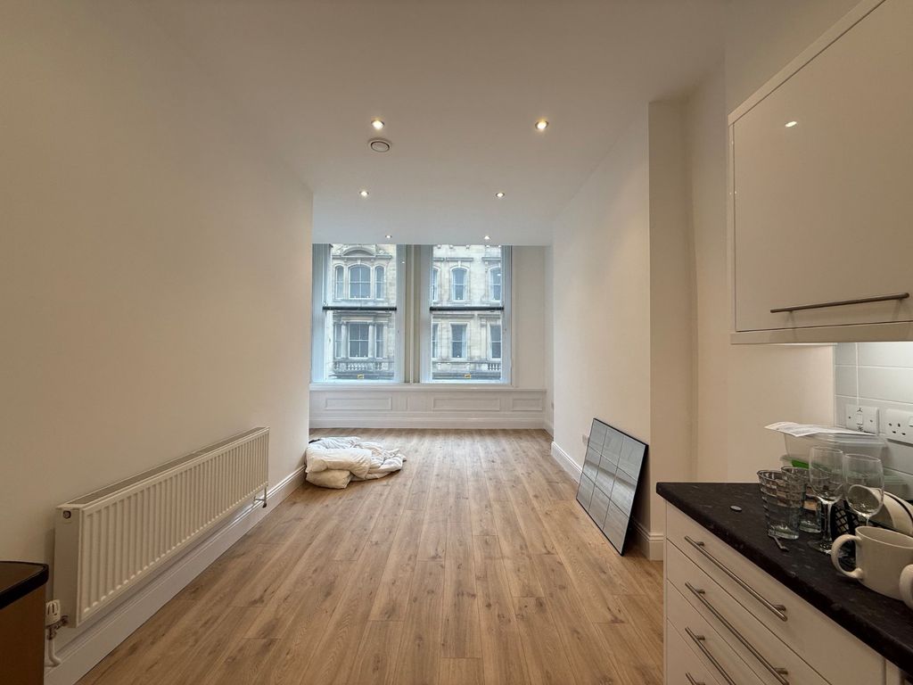 Property photo 2 of 8 Kitchen/Living Area