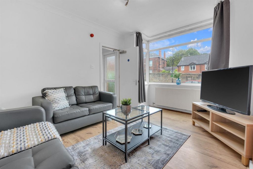 Property photo 1 of 11 Bright Living Area With Comfortable Sofas And TV...
