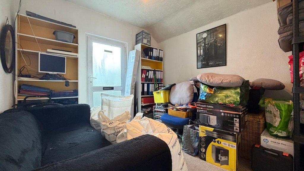 Property photo 3 of 8 Cosy Living Room With A Comfortable Sofa, Shelving...