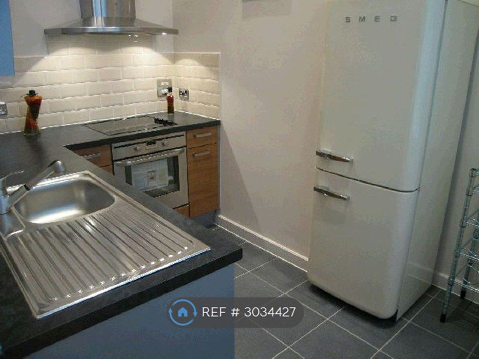 Property photo 3 of 7 Kitchen