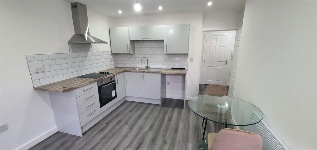 Property photo 2 of 8 Modern Open-Plan Kitchen With Pale Cabinetry, Stai...