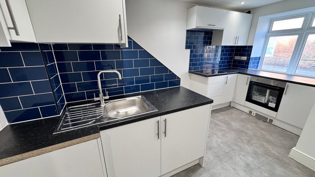 Property photo 3 of 10 Kitchen
