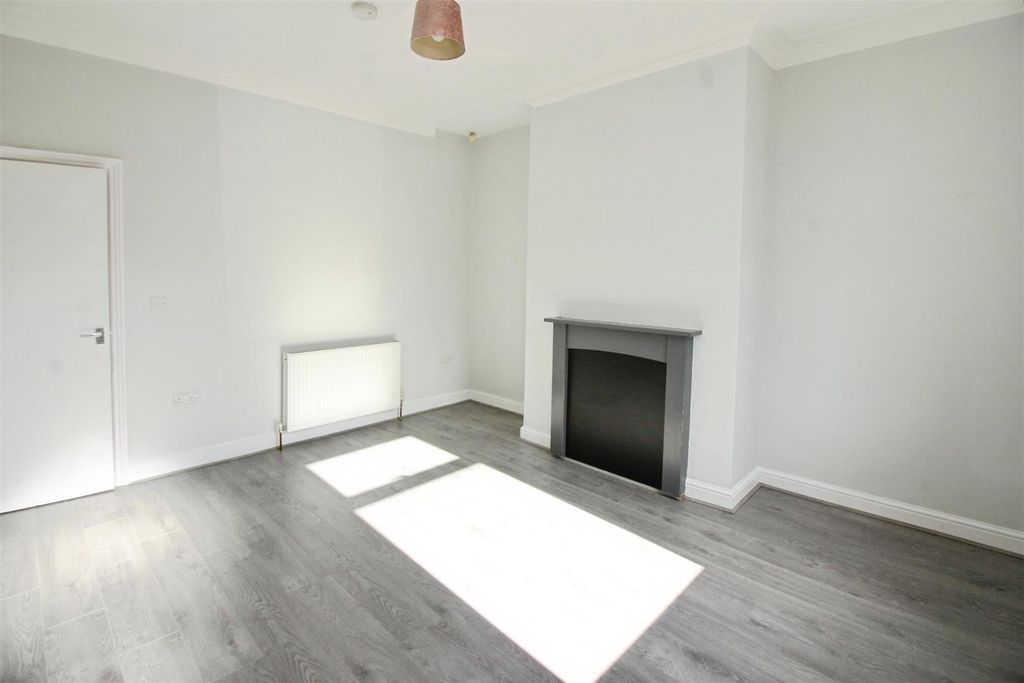 Property photo 2 of 12 Living Room