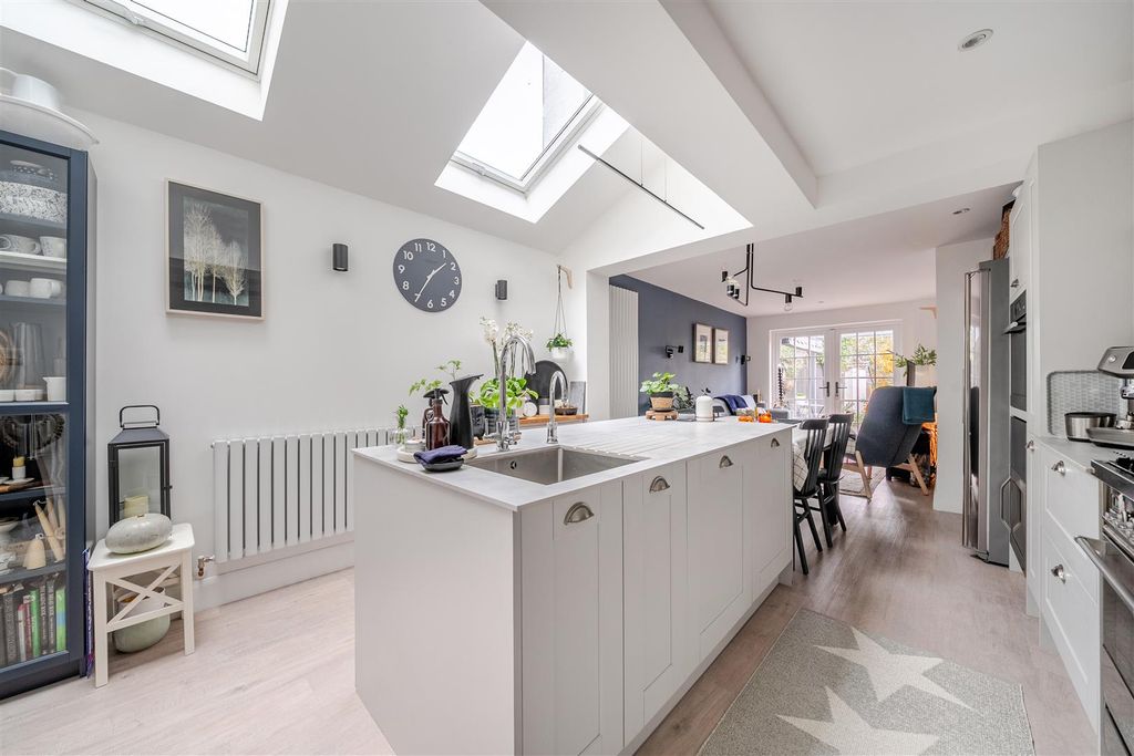 Property photo 2 of 19 Kitchen/Dining/Family Room