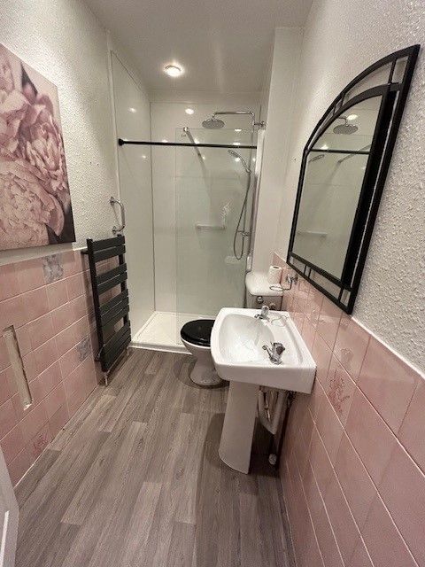 Property photo 3 of 4 Bathroom With Walk-In Shower