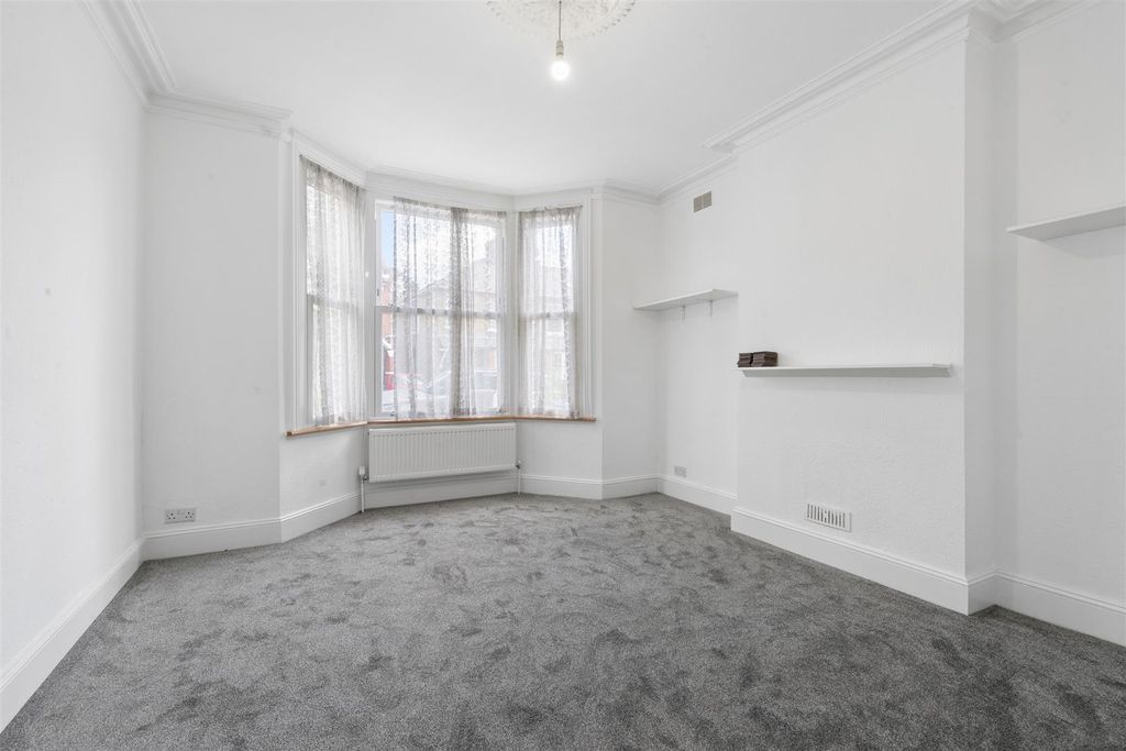 Property photo 1 of 11 Fairlawn Road Sw19 Reception 1