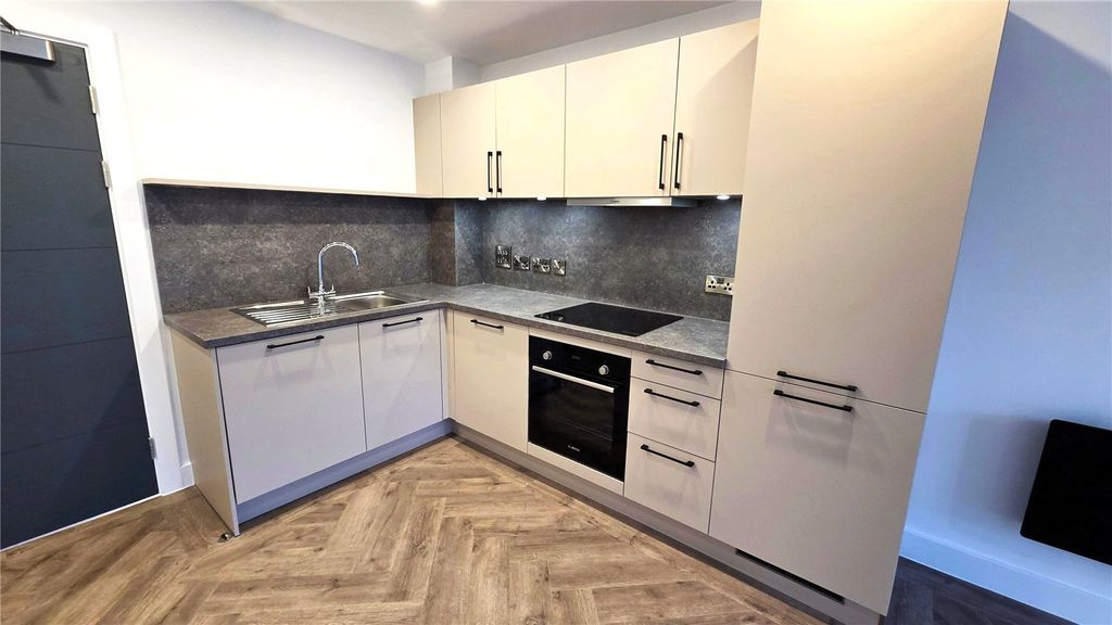 Property photo 2 of 9 Kitchen Area