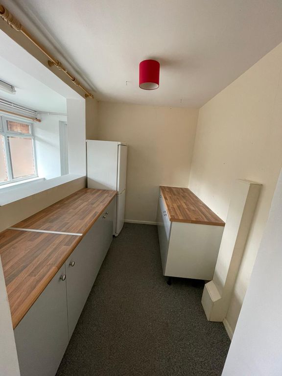 Property photo 3 of 6 A Neat And Functional Kitchen Space With Wooden Co...