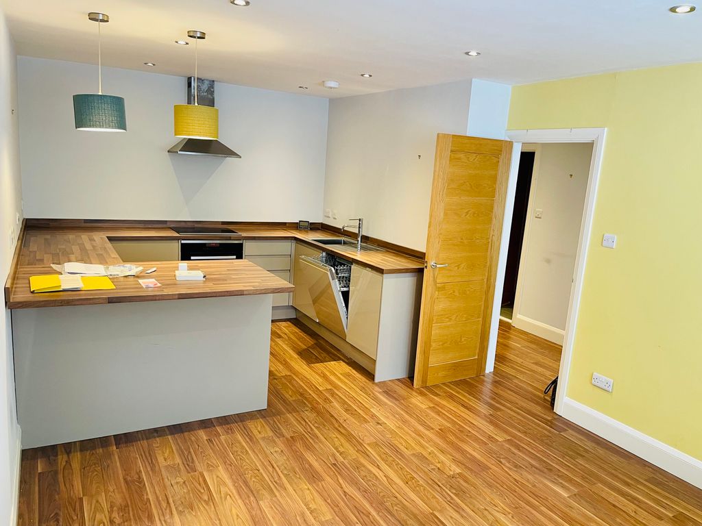 Property photo 1 of 16 Kitchen Area