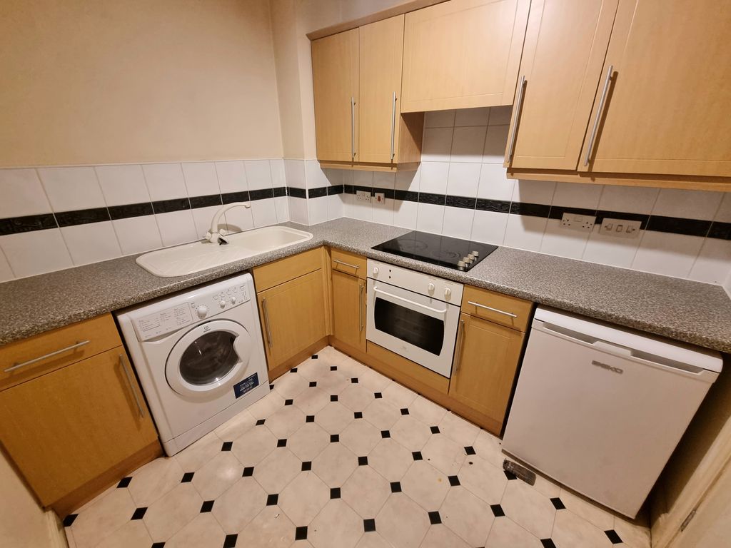 Property photo 3 of 6 3. Kitchen