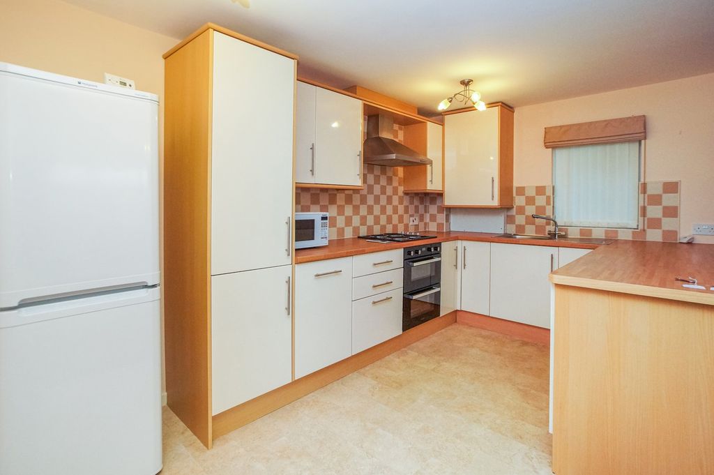 Property photo 2 of 14 Kitchen Area