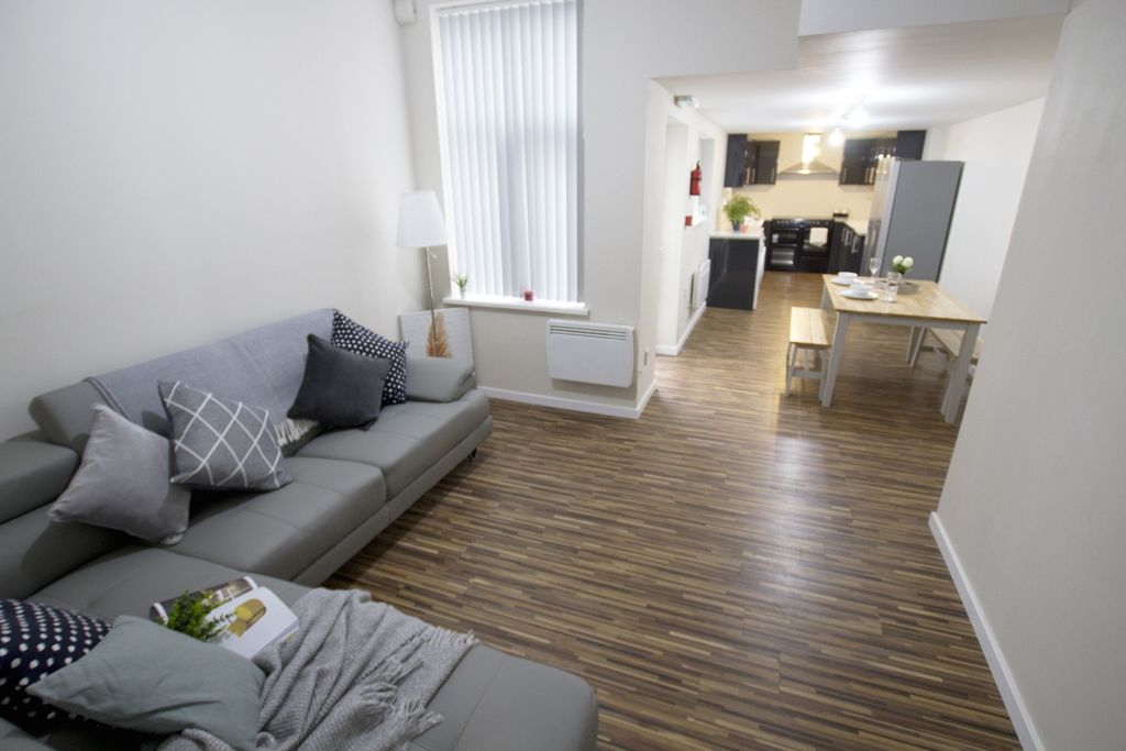 Property photo 2 of 10 Bright And Spacious Living Area With Modern Decor,...