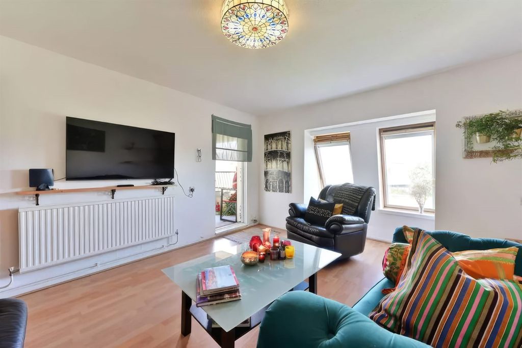 Property photo 3 of 11 Living Area