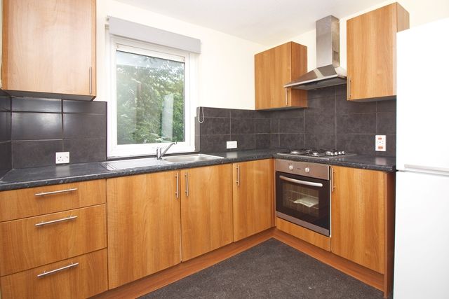 Property photo 3 of 8 Kitchen