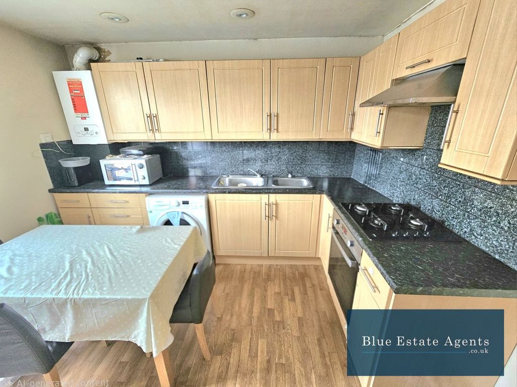 Property photo 1 of 7 Kitchen