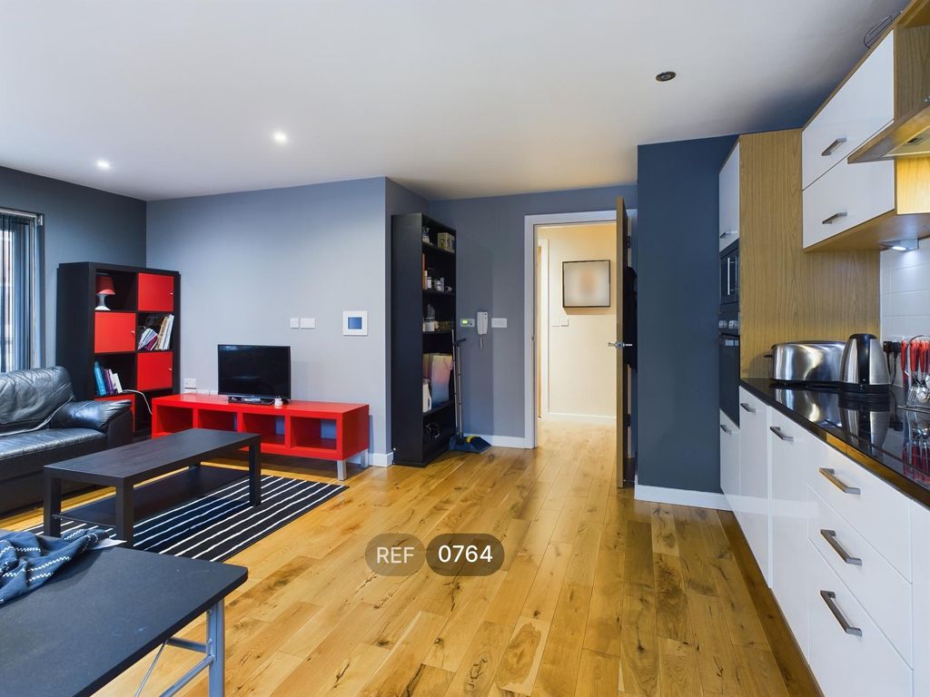 Property photo 2 of 14 Kitchen & Living Area