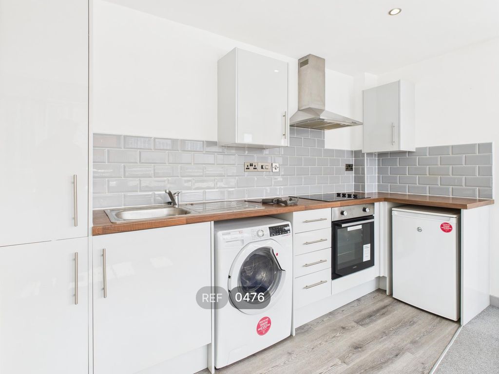 Property photo 1 of 12 Kitchen & Living Area