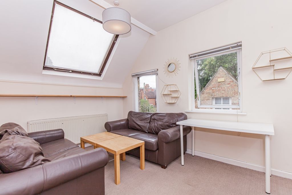 Property photo 3 of 12 Living Area