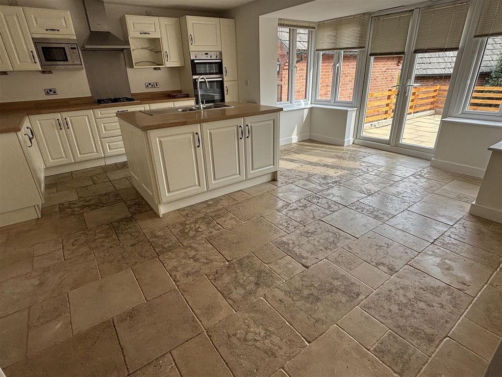 Property photo 2 of 17 Dining Kitchen: