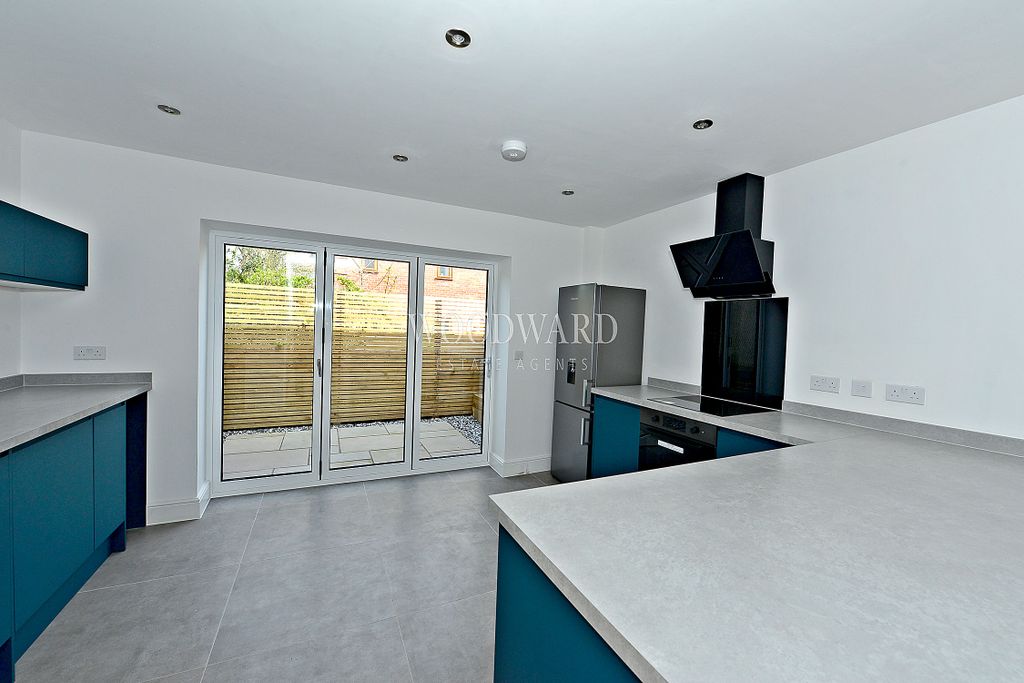 Property photo 2 of 12 Kitchen Area