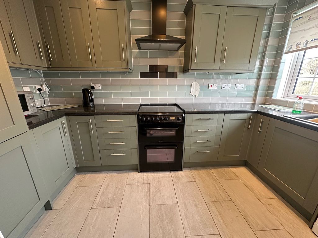 Property photo 2 of 13 Kitchen